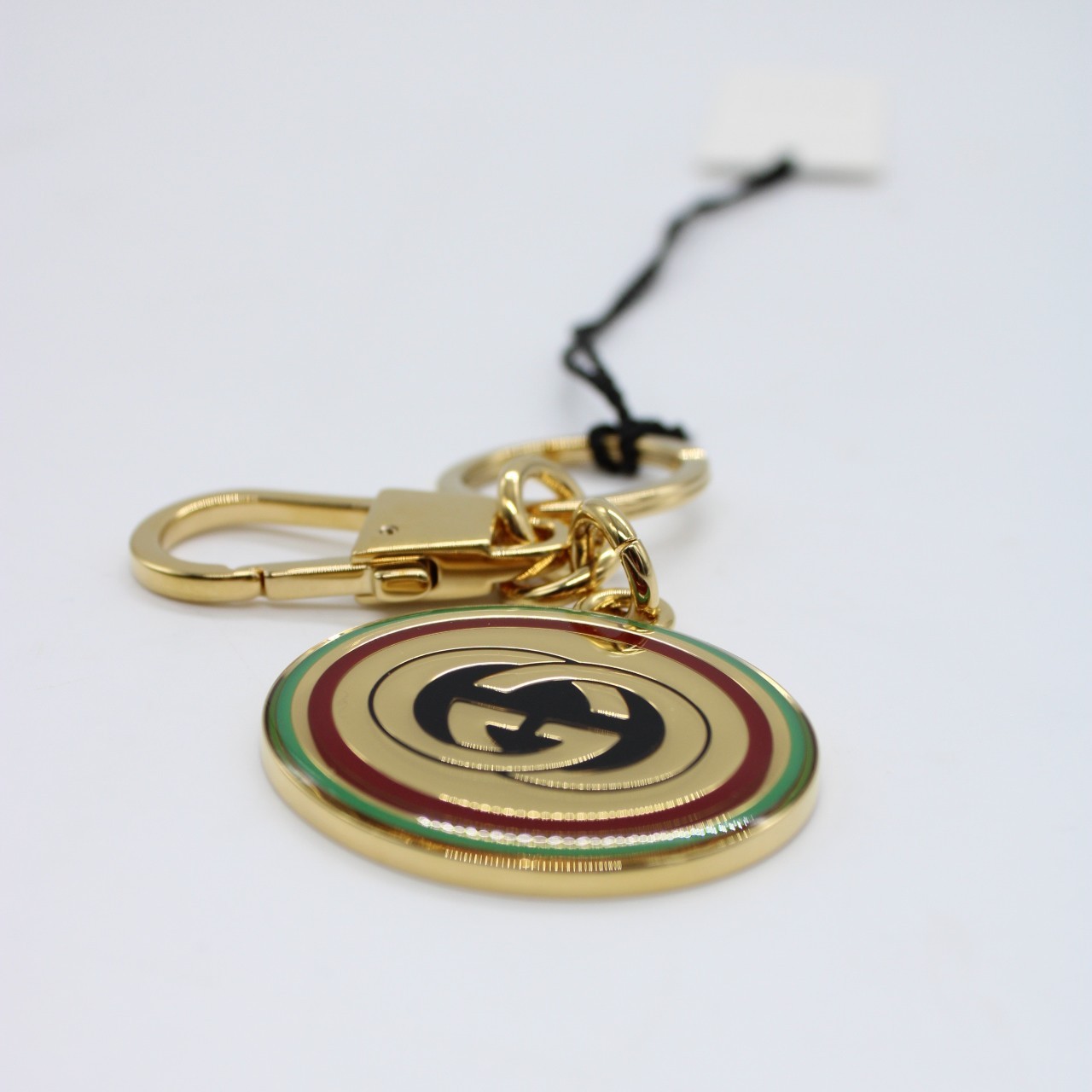 Portachiavi Gucci in smalto con incrocio GG thumb
