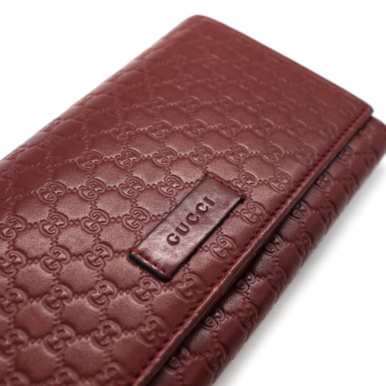 Portafoglio Gucci in pelle guccissima bordeaux thumb