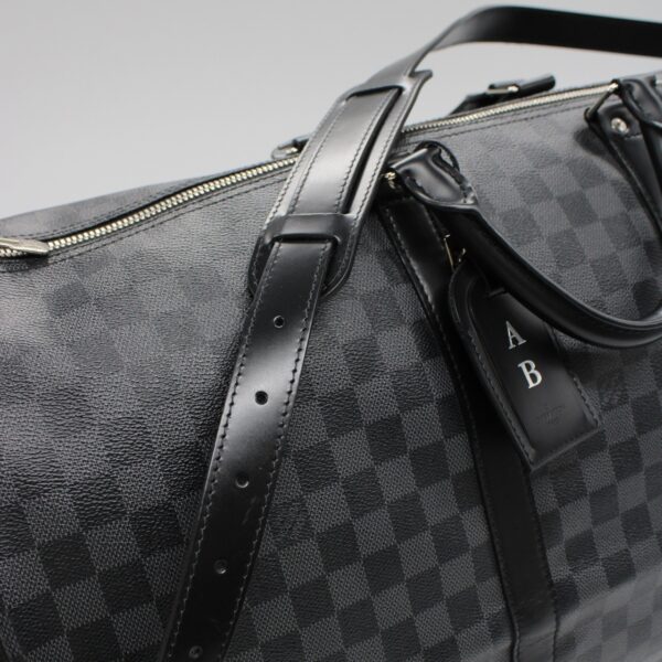 Keepall Louis Vuitton bandouliere 55 in damier graphit