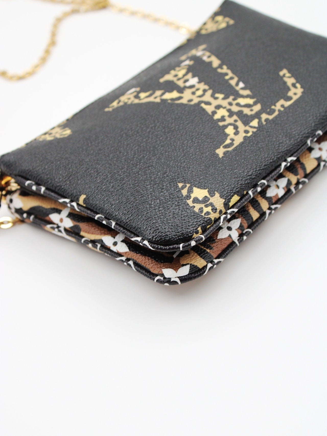 Pochette Louis Vuitton Jungle double zip thumb