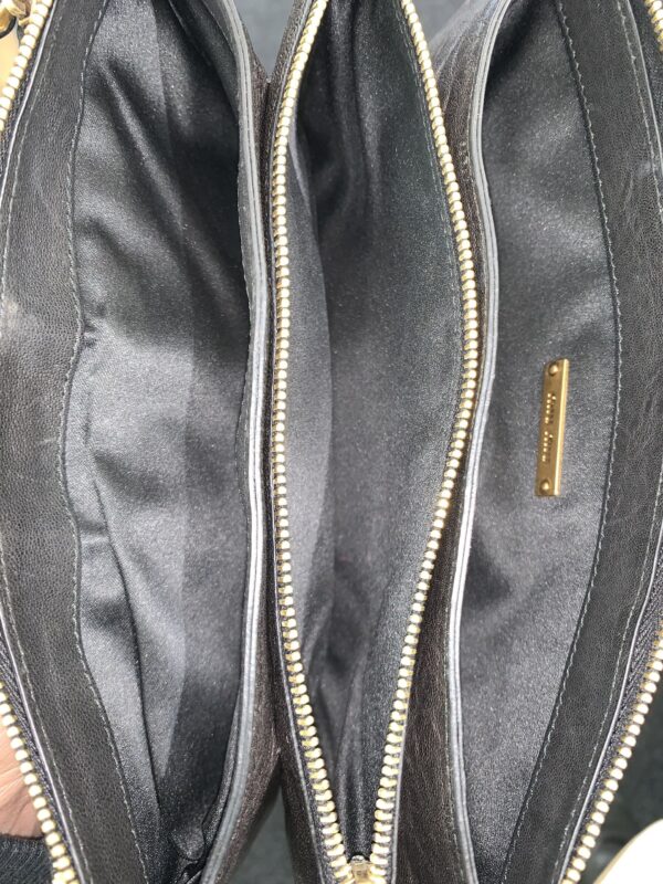 Pochette Miu Miu in pelle nera con borchie