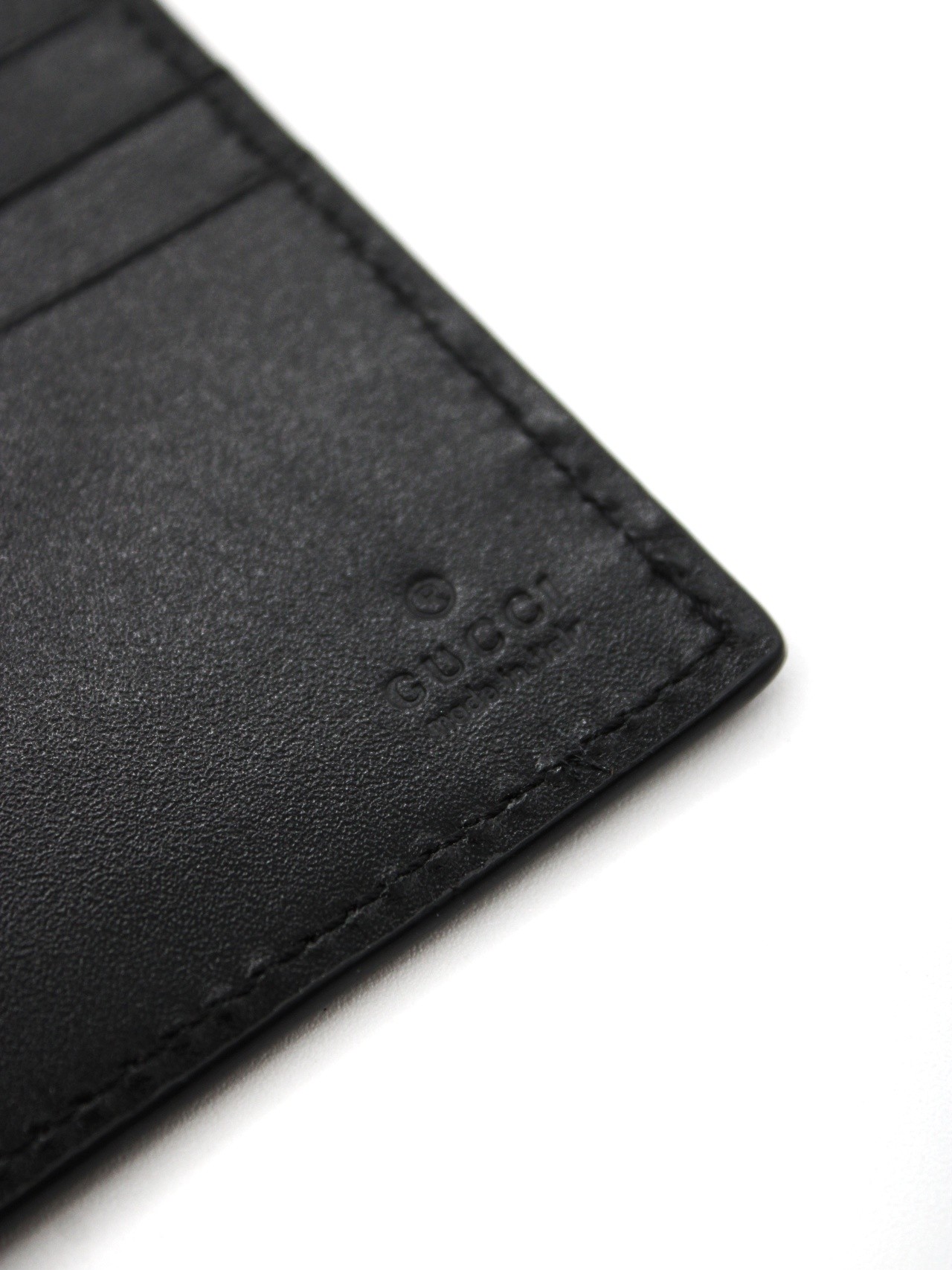 Portafoglio Gucci bifold con GG in rilievo thumb