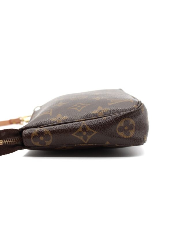 Pochette Louis Vuitton NM Accessoires in monogram