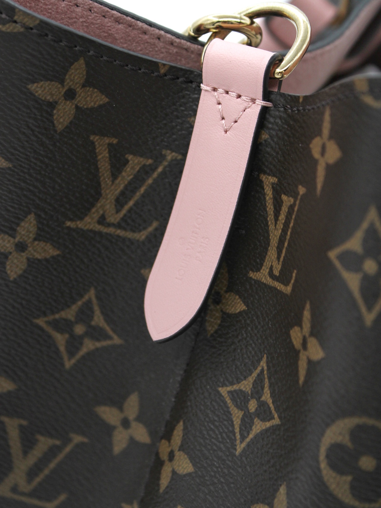 Borsa Louis Vuitton NéoNoé MM in monogram ed inserti rosa thumb
