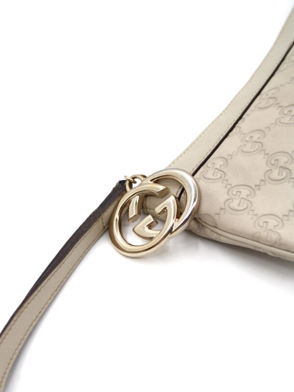 Privato: Pochette Gucci in pelle Guccissima